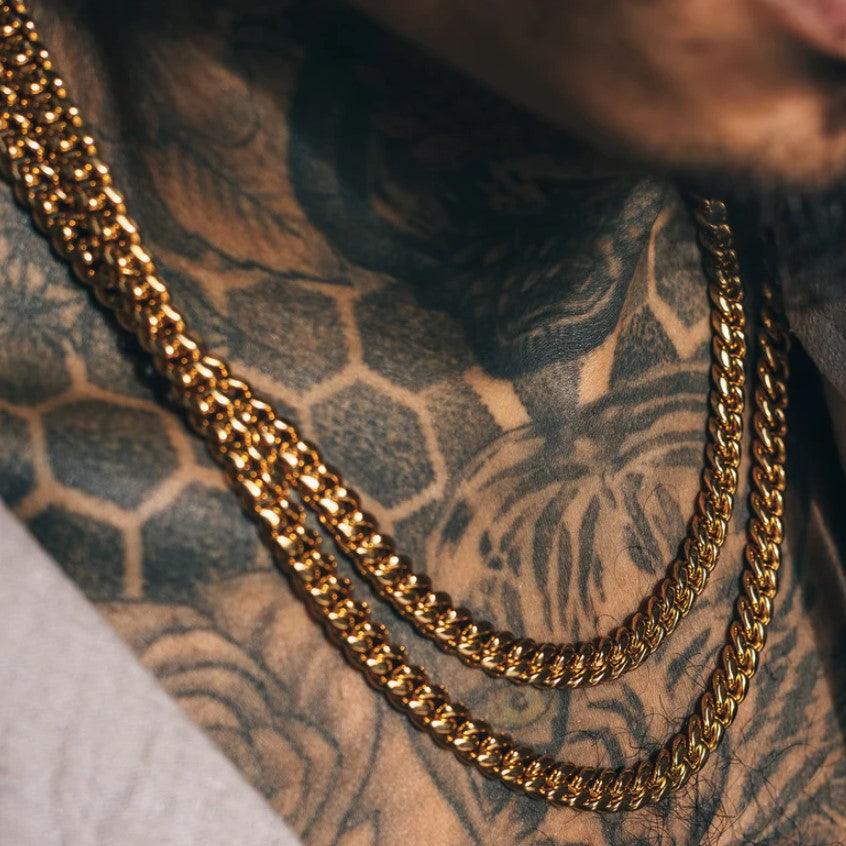 Beyond a Status Symbol: Exploring the Cultural Significance and Design of Cuban Link Chains - Hommes Oro